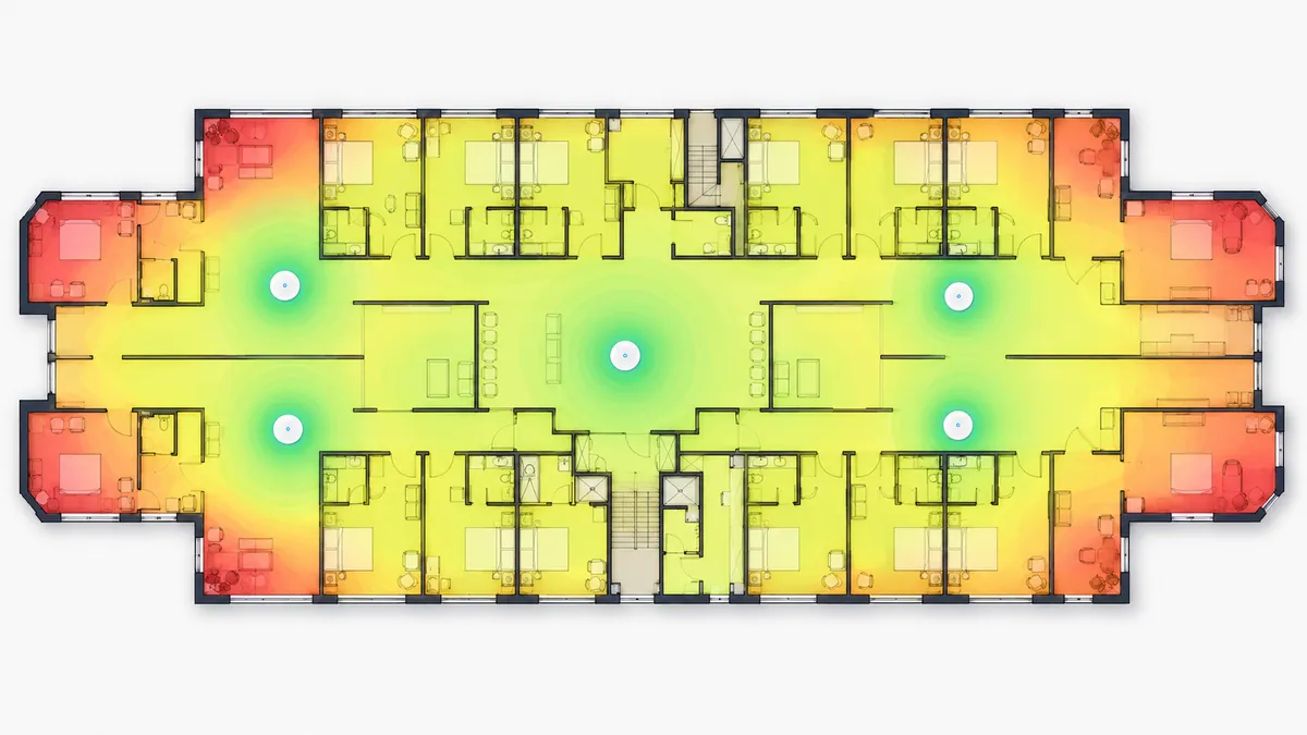 Mapa de calor WiFi sobre el plano de un hotel, con buena cobertura en las habitaciones y zonas comunes